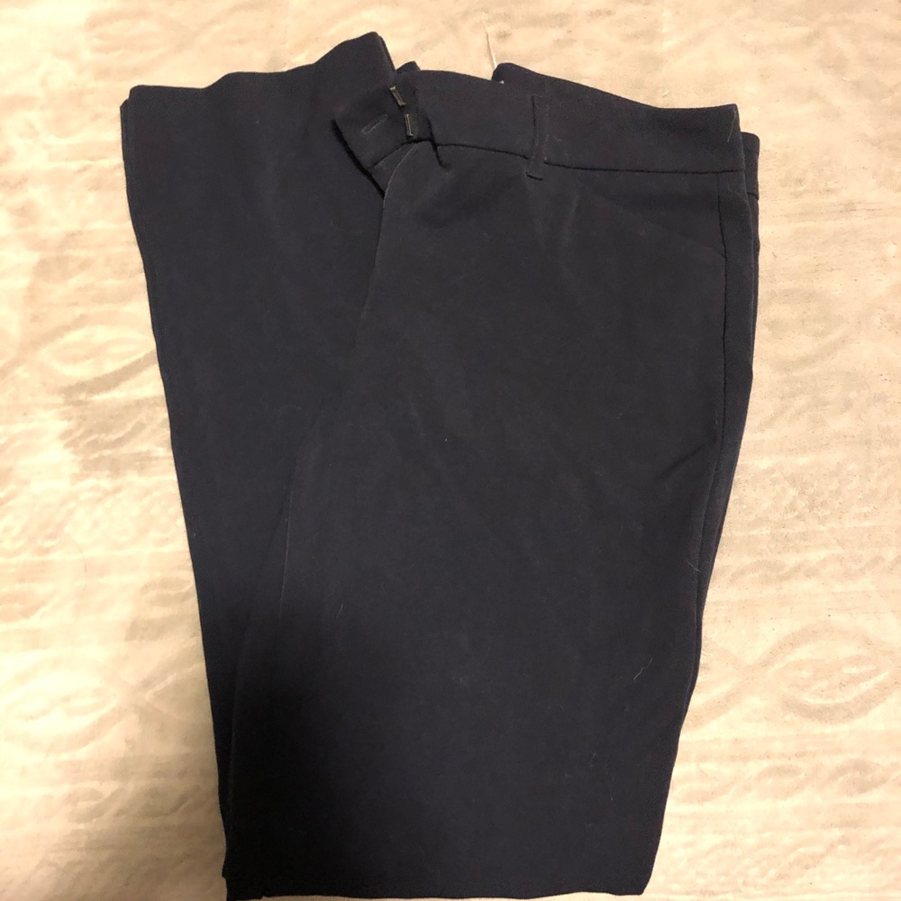 Maurice’s navy slacks